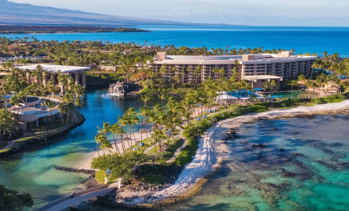 Hawaiian resort with lagoon and palm trees on the Big Island coast